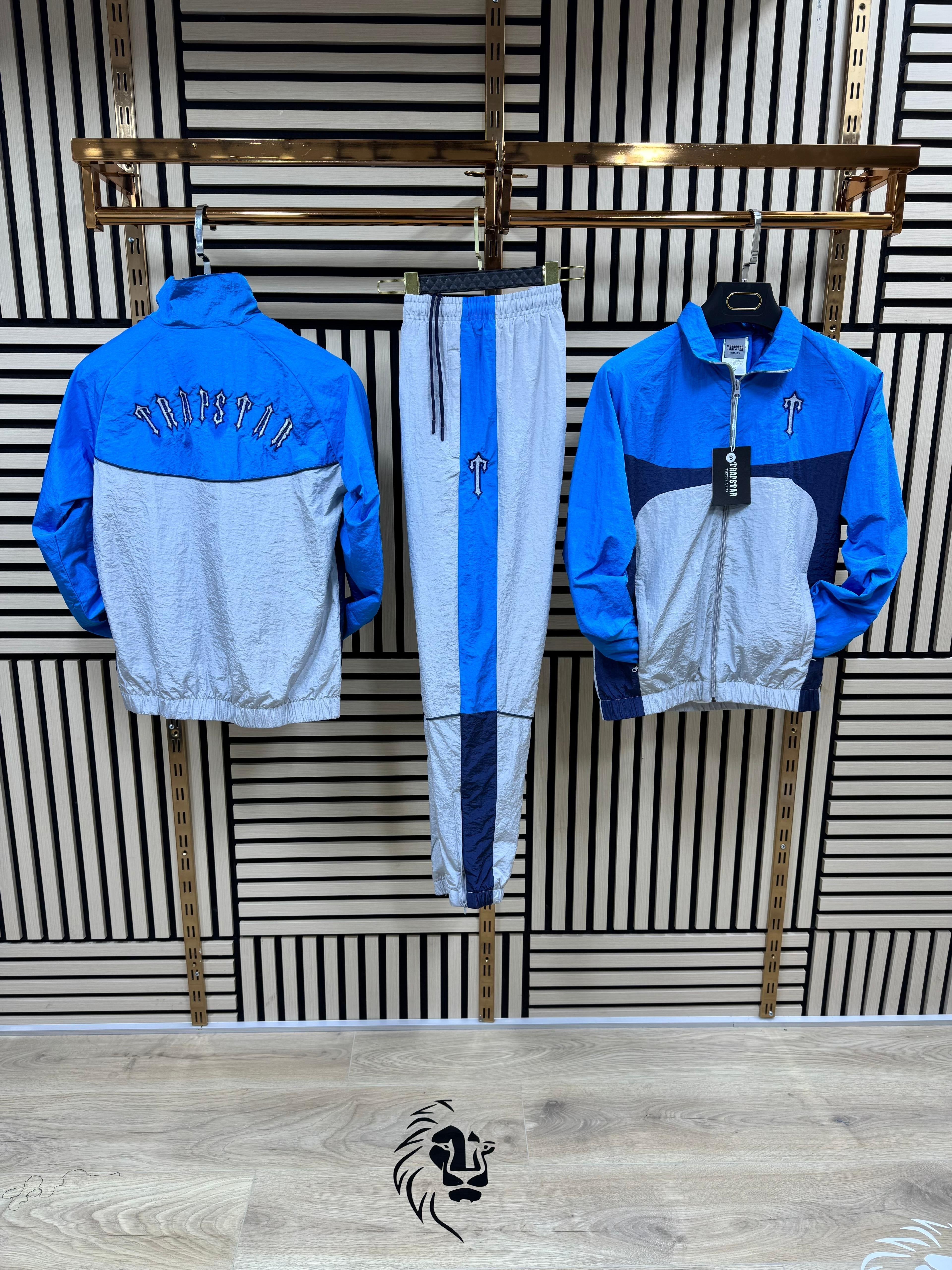 Chandal Trapstar azul y gris